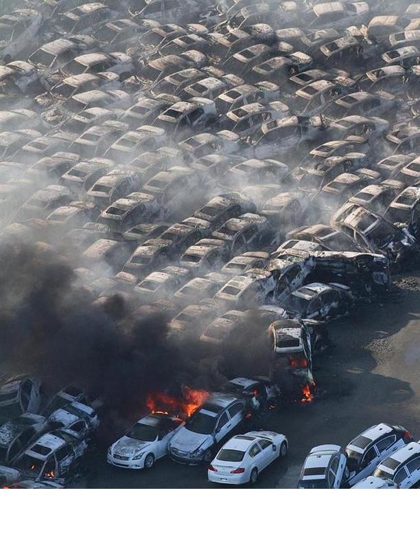 nissan and infiniti vehicles burned after japan earthquake and tsunami are destroyed