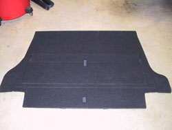 Spare tire kit for 2009 through 2012 Infiniti G37 convertibles image showing trunk mat