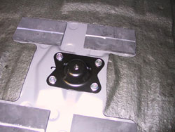 Spare tire kit for 2009 through 2012 Infiniti G37 convertibles image showing close up of tire mounting bracket