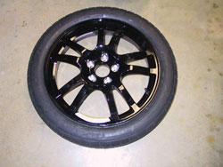 Spare tire kit for 2009 through 2012 Infiniti G37 convertibles Spare rim with tire mounted