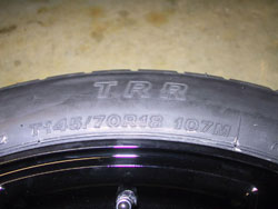 Spare tire kit for 2009 through 2012 Infiniti G37 convertibles close up of tire specifications